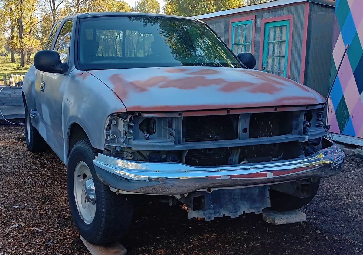 rusty salvage truck before